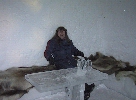 Ice Hotel - sitting on reindeer skins