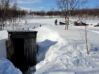 
Getting the ouadto be moved aside before we could get to a hole in the ice to fetch water from the lake.thouse ready