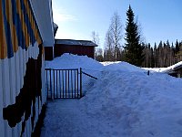 Snow over garden fence