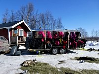 Dog jackets drying on trailer