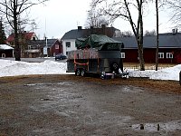 Dog trailer on hostel parking lot