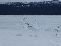 Wet trail on lake near Bjoerkudden