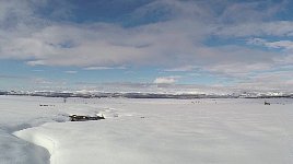 Dog sledding on mountain plateau