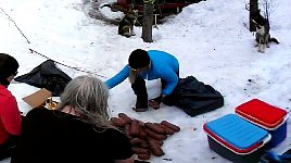 Peeling sausages for dog feeding