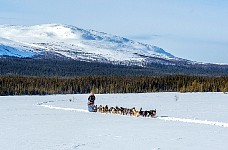 Me with big team and mountain background