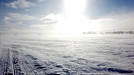 Windy frozen lake