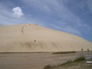 Sandboarding on a dune